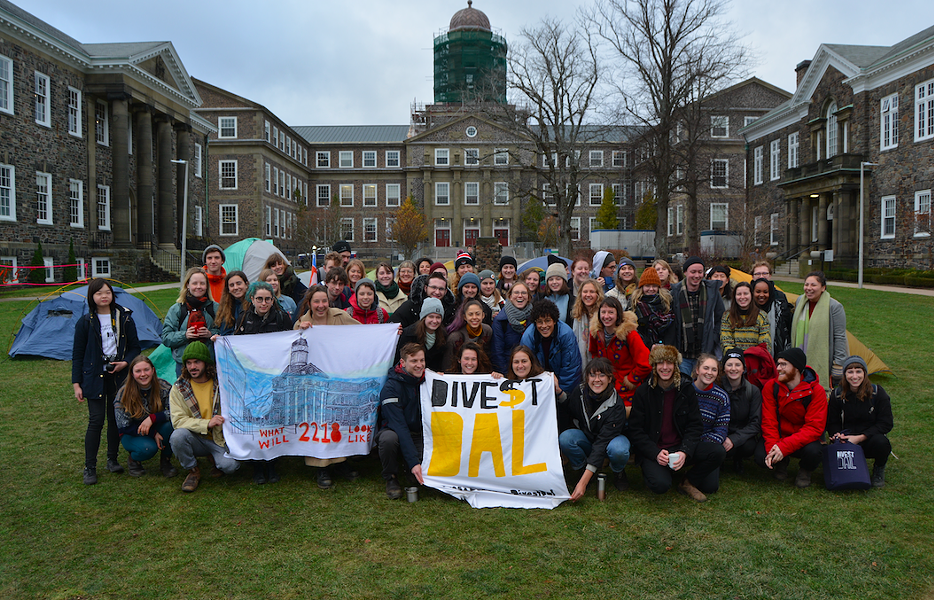 Alex Ayton is a Divest Dal committee member, pictured here with other Dalhousie students protesting on the quad. - VIA SAHAR ATBAEI