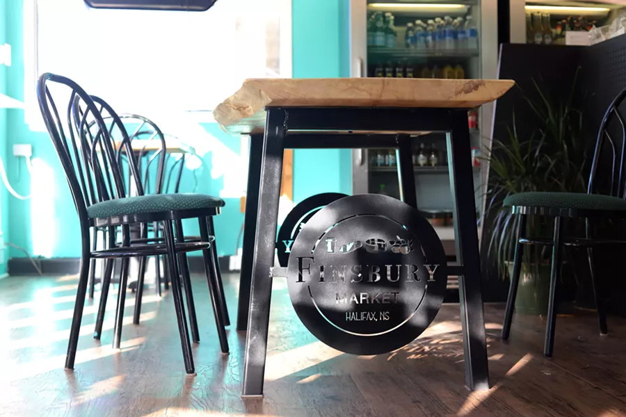 Finsbury's logo custom-made into the legs of a table in their brand new seating area. - VICTORIA WALTON