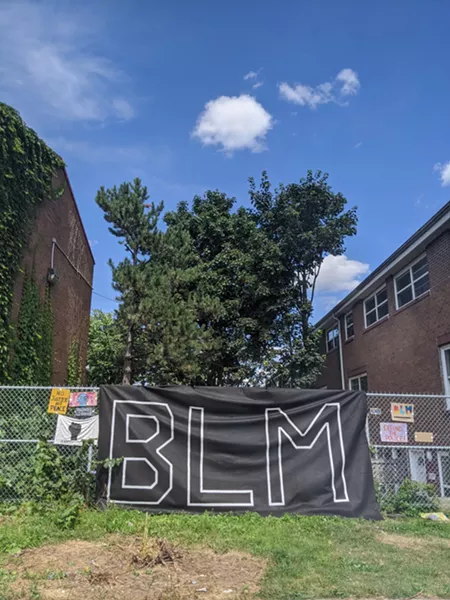 The sign, donated by a community member, was taken down in the middle of the night on September 1. In just over a week a new one had taken its place. - CAORA MCKENNA