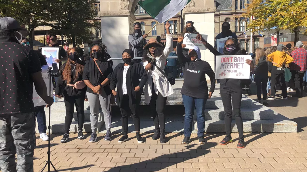 Protesters at Halifax's Grand Parade calling to #ENDSARS. - SEYITAN MORITIWON