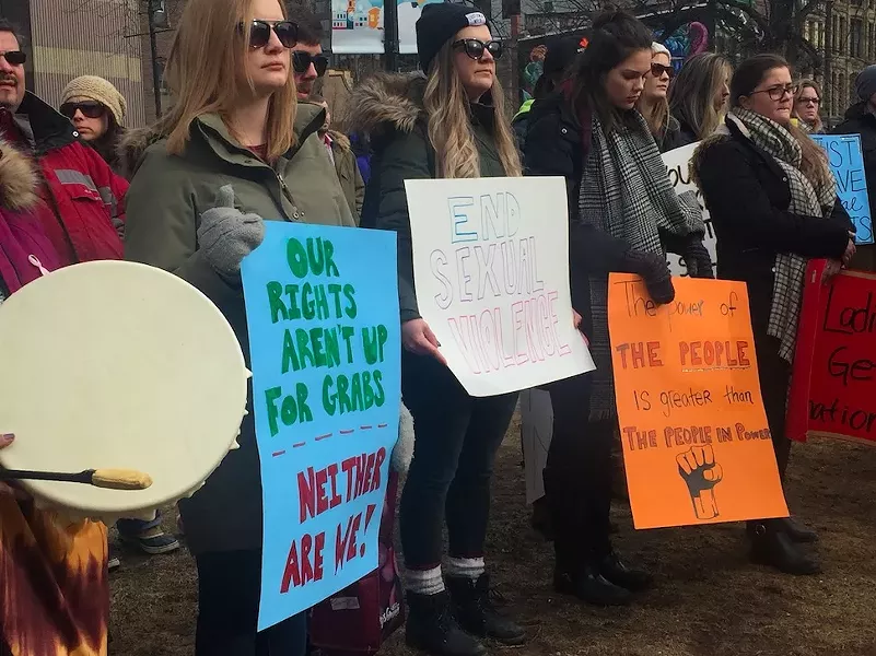 Protesters gather at Grand Parade on Tuesday. - MAGGIE RAHR