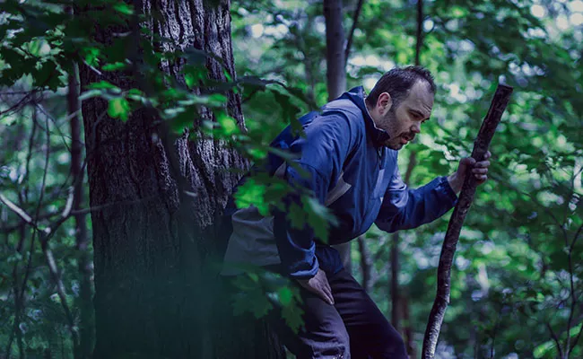 Labelle is lost—or maybe he isn’t—in The Woodcutter. - SAMM FISHER