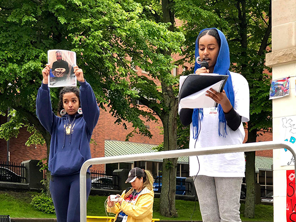 Biographies of the martyrs from the June 3 massacre were being read while their pictures were held to honour the meaningful lives they led. - SUBMITTED