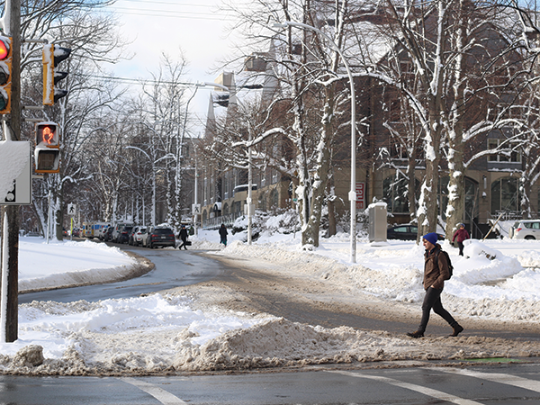 When it snows, the part of the road that cars actually use is exposed—and a lot more space for pedestrians, too. - VICTORIA WALTON