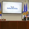 Chuck Porter, the minister of municipal affairs and housing announces to an empty room and reporters on the phone that the government is bringing rent control back—27 years after it got rid of it. Chuck Porter, the minister of municipal affairs and housing announces to an empty room and reporters on the phone that the government is bringing rent control back—27 years after it got rid of it.