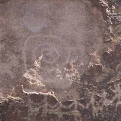 Equinox “sun dagger” on spiral petroglyph at Picture Rocks site, Pima County, Arizona