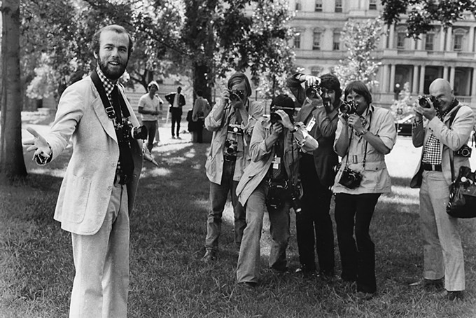David Burnett, "David Hume Kennerly, Photographer, and His Colleagues, White House Lawn, Washington, D.C.," 1974, Center for Creative Photography, The University of Arizona: David Hume Kennerly Archive. © 2020 David Burnett/Contact Press Images