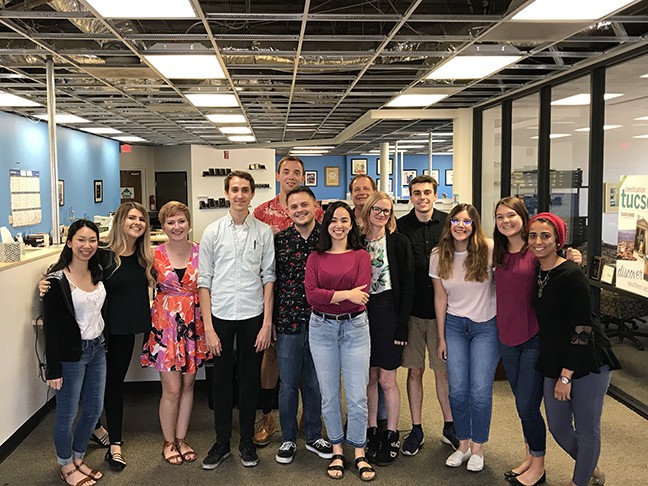 Interns posed with their editors for a group photo on their last day.