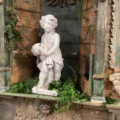 A garden statue featured at this market