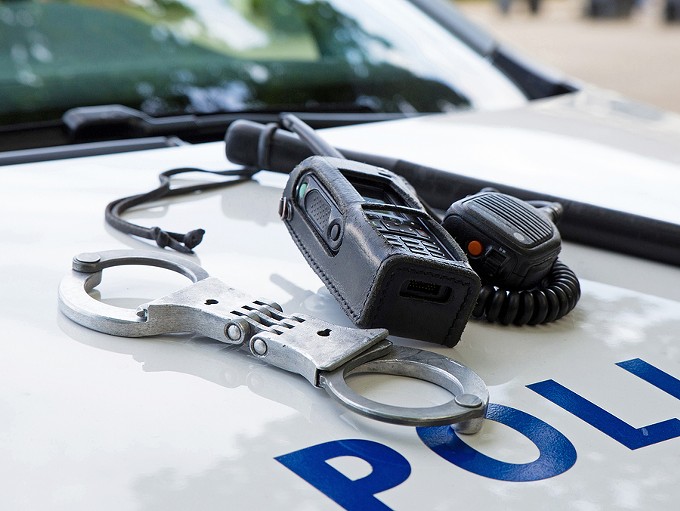 bigstock-police-equipment-on-a-police--148261448.jpg