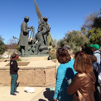 Attendees learn about many historic places and statues on the Turquoise Trail Walking Tour