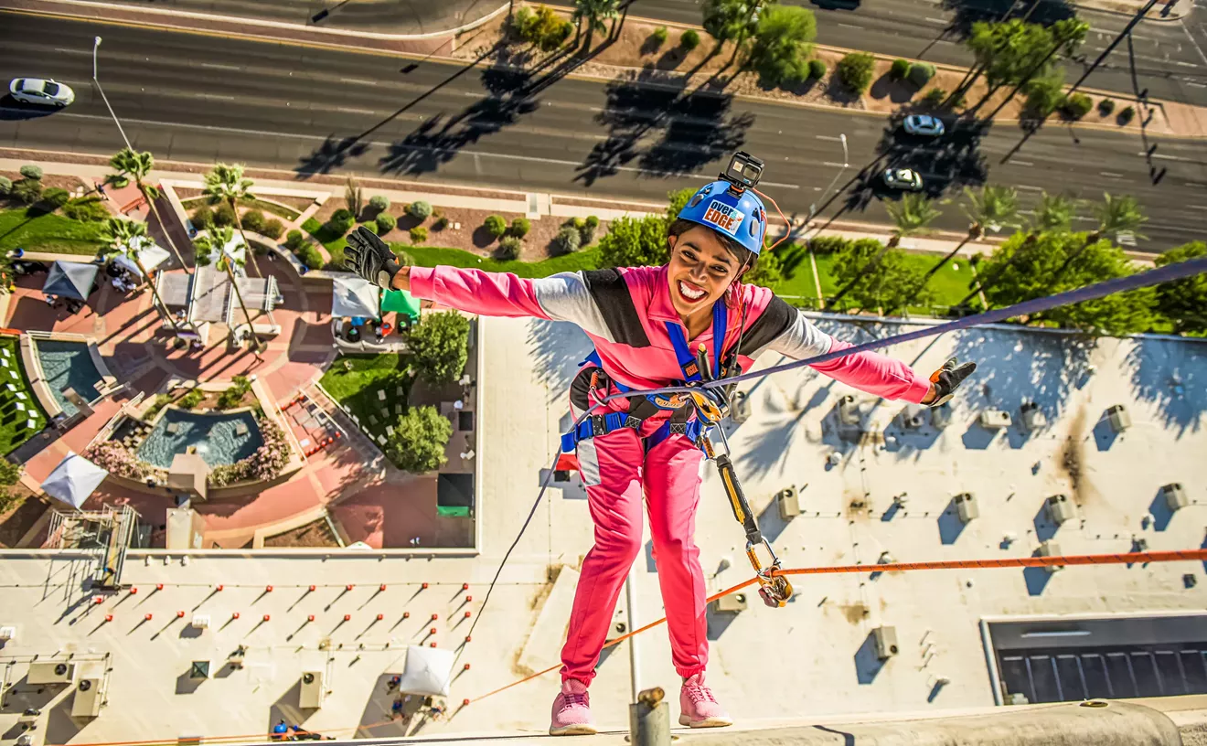 Supporters go over the edge rappelling for Girl Scouts