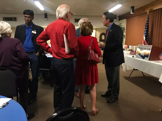 Gubernatorial candidate Ken Bennett (right) speaks with audience members after an event hosted by the Pima County Republican Club. - KATHLEEN B. KUNZ