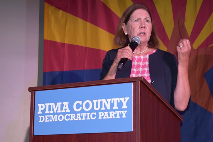Ann Kirkpatrick takes the stage at the Pima County Democrats election event, with a comfortable lead over her opponents in the CD 2 Democratic primary - SAVANAH MODESITT