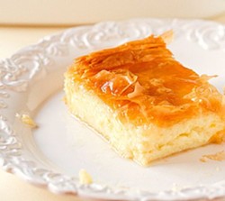 Galaktoboureko is a traditional rich and creamy Greek dessert drenched with a lemon and orange-infused syrup. - BROWN EYED BAKER