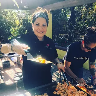 At the 2018 SAVOR Southern Arizona Food & Wine Festival, Chef Maria Mazon of BOCA Tacos Y Tequila serves up shrimp tacos splashed with kumquat courtesy of Iskashitaa Refugee Network. - PIVOT PRODUCE