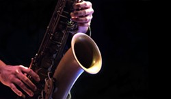 bigstock-jazz-musician-playing-the-saxo-312848242.jpg