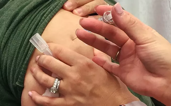 Arizona officials are urging people to get flu shots this fall to avoid the double threat of flu and COVID-19, which they fear could overburden state hospitals. But the state's vaccination track record is not great, with just 42.6% of adults getting flu shots last year. Photo by NIAID/Creative Commons