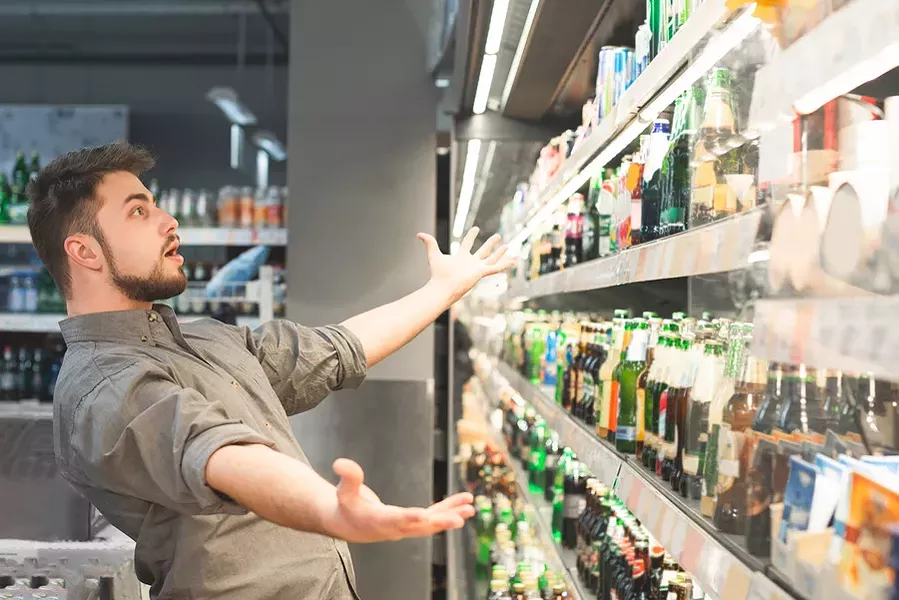 bigstock-funny-adult-looks-at-the-shelf-305720512.jpg