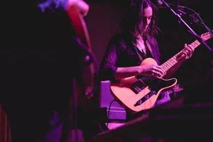 Sam Rae performs with both cello and electric guitar. - COURTESY