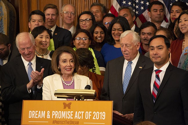House Speaker Nancy Pelosi, flanked by other Democratic House leaders and back by DACA recipients, rallied for a Dream Act bill that passed along part lines June 4.
